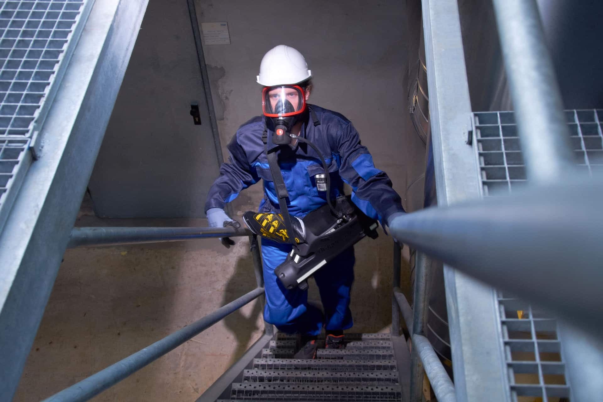 The positive-pressure breathing device can be used in conjunction with other safety equipment such as ear protectors or helmets.